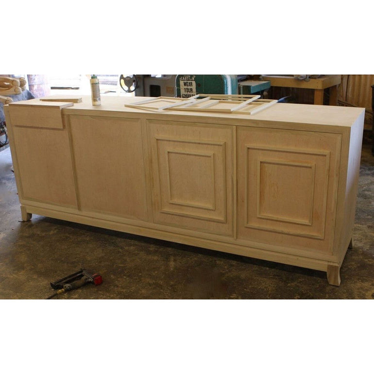 assembling the raised panel door moldings for this media cabinet 