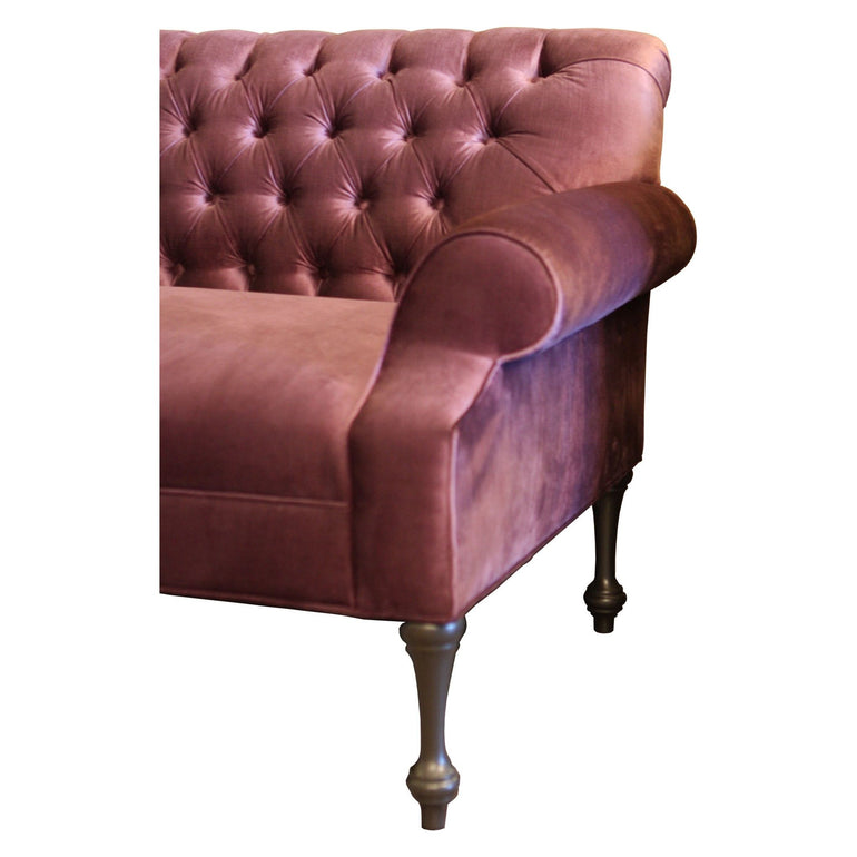 Traditional tight-back tufted sofa with deep tufting and rolled arms