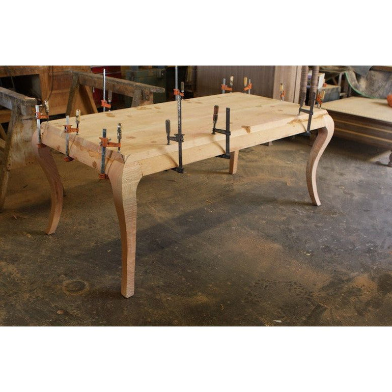 Custom Wood Shop Assembling Dining Tables 