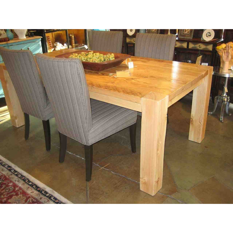 Roca dining table featured with Tulip chairs