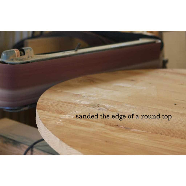 A table top belt sander doing it's sanding magic