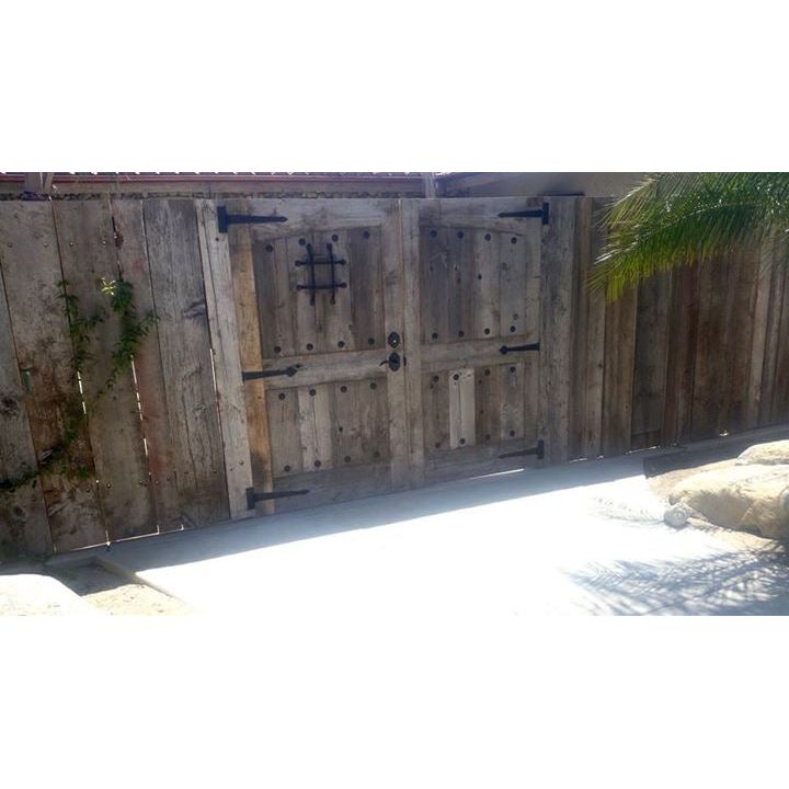 custom-made barn wood front gate and fence 