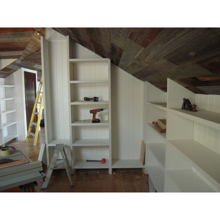 Builtin Bookcase and Salvaged Barn Wood Ceiling in Malibu