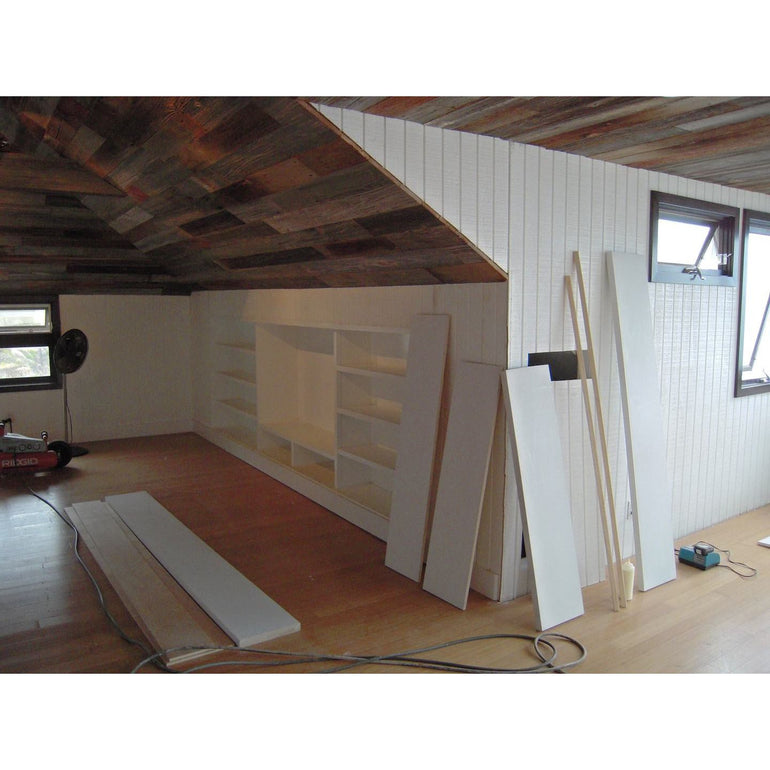 Builtin Bookcase and Salvaged Barn Wood Ceiling in Malibu