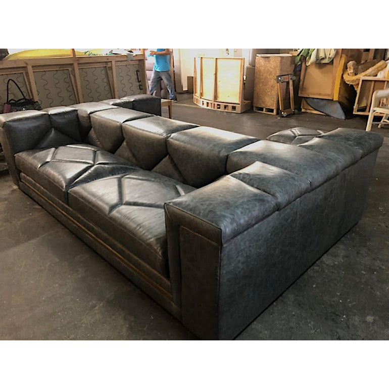 diamond tufted double sofa in leather 